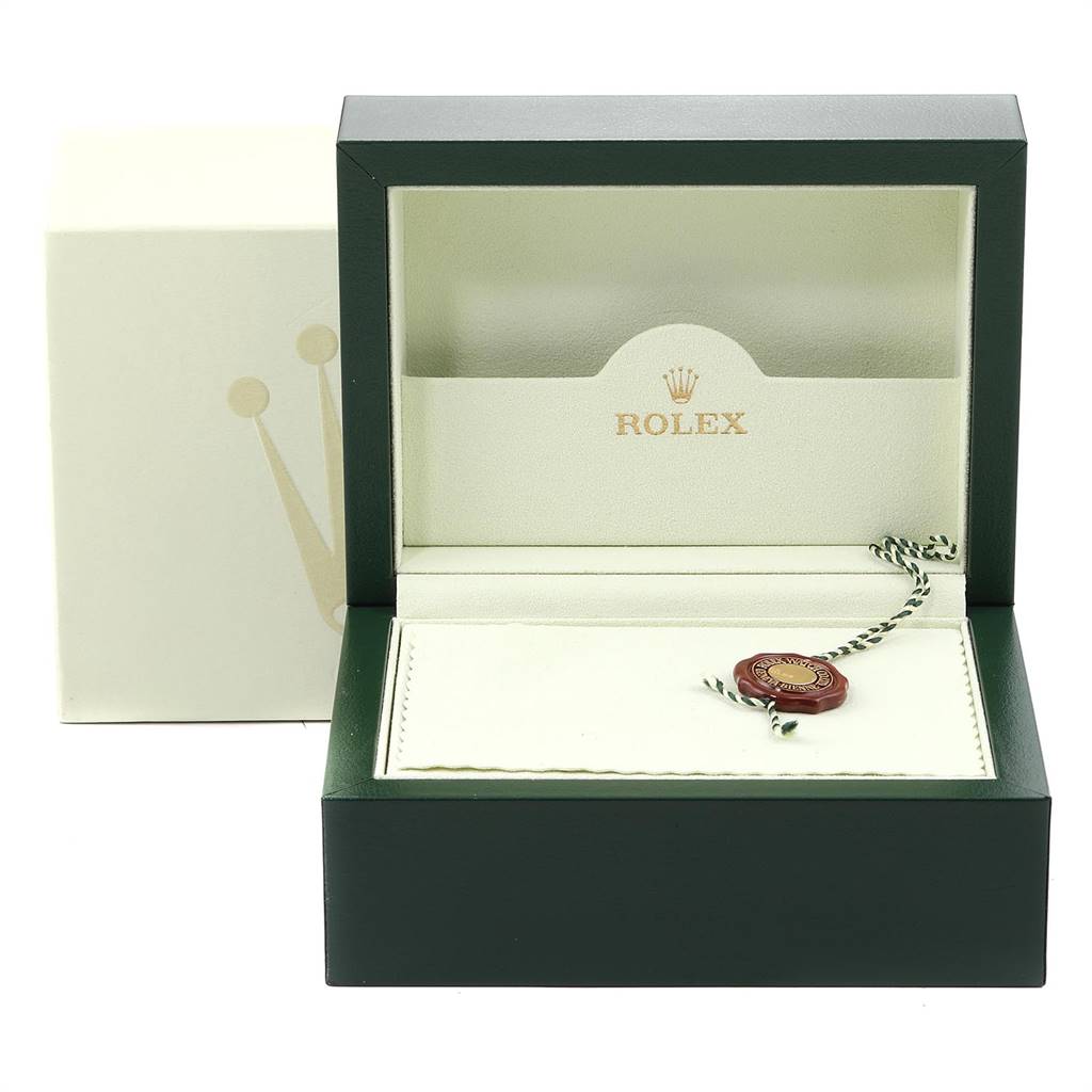 The image shows an open Rolex Date 115200 Men's Stainless Steel Black Dial 115200 Men's Stainless Steel Black Dial model watch box with an authenticity seal.