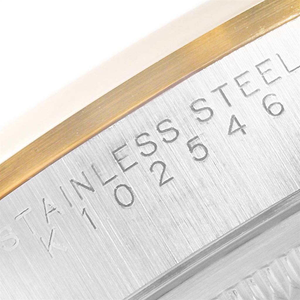 This image shows a close-up of the stainless steel case and bezel of a Rolex Date 15203 Men's Steel and Gold (two tone) White Dial 15203 Men's Steel and Gold (two tone) White Dial model watch.