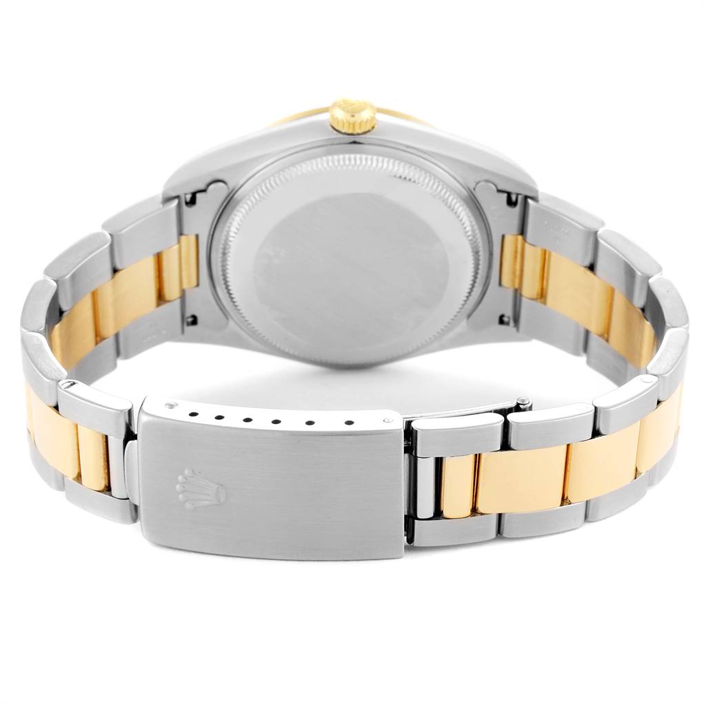 This image shows the back case and bracelet of a Rolex Date 15203 Men's Steel and Gold (two tone) White Dial 15203 Men's Steel and Gold (two tone) White Dial model watch.