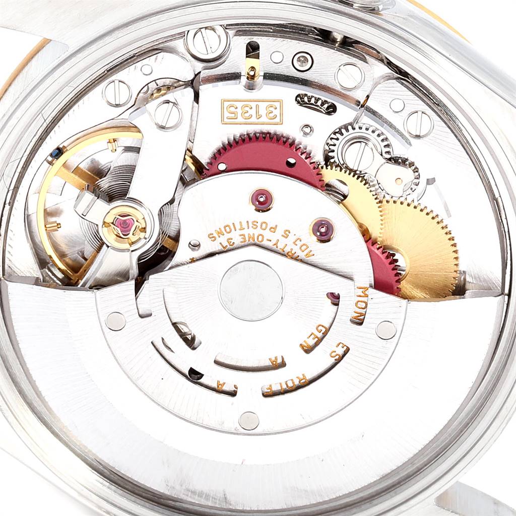 This image shows the movement mechanism of a Rolex Date 15223 Men's Steel and Gold (two tone) White Dial 15223 Men's Steel and Gold (two tone) White Dial watch, captured from the back.