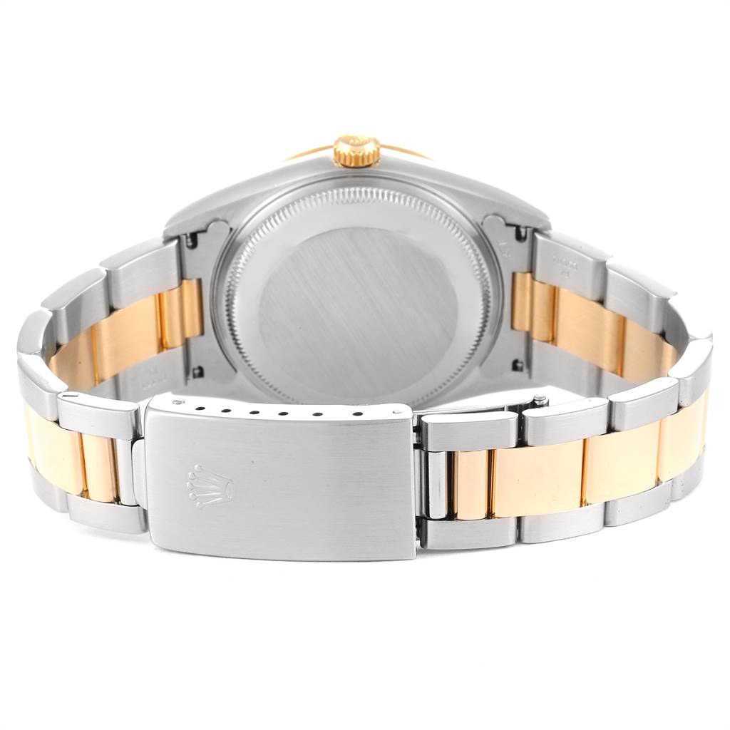 This image shows the back case and bracelet of the Rolex Date 15223 Men's Steel and Gold (two tone) White Dial 15223 Men's Steel and Gold (two tone) White Dial model watch.