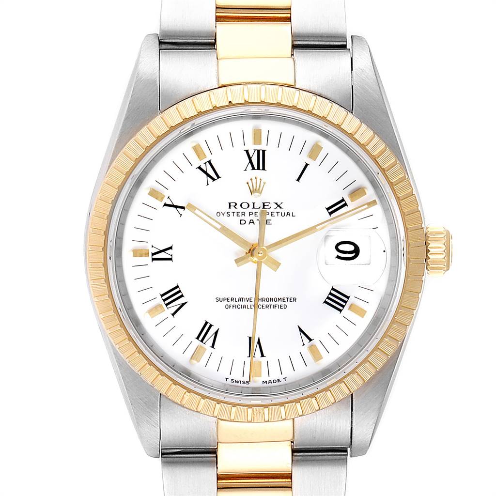 This image shows a Rolex Oyster Perpetual Date watch with a two-tone bracelet, fluted bezel, and white dial featuring Roman numerals.