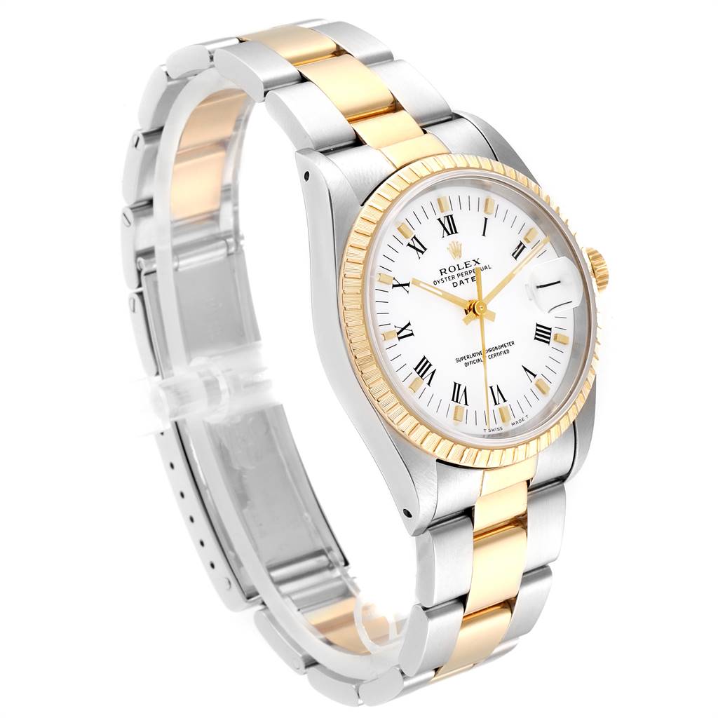 This image shows a three-quarter angle view of the Rolex Date 15223 Men's Steel and Gold (two tone) White Dial 15223 Men's Steel and Gold (two tone) White Dial model watch featuring a two-tone metal band and fluted bezel.