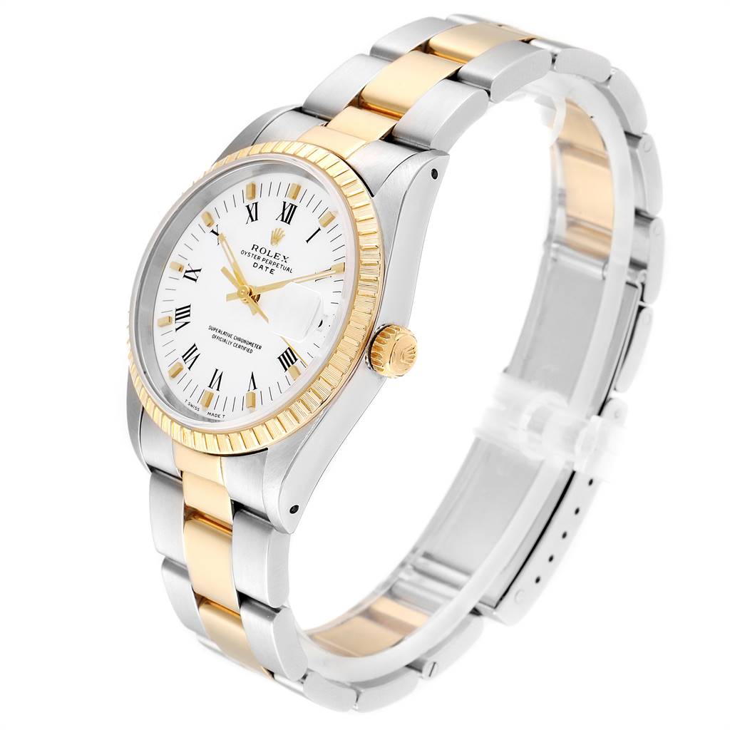 The Rolex Date 15223 Men's Steel and Gold (two tone) White Dial 15223 Men's Steel and Gold (two tone) White Dial model watch is shown at a 3/4 angle, displaying its white dial, gold fluted bezel, and two-tone bracelet.