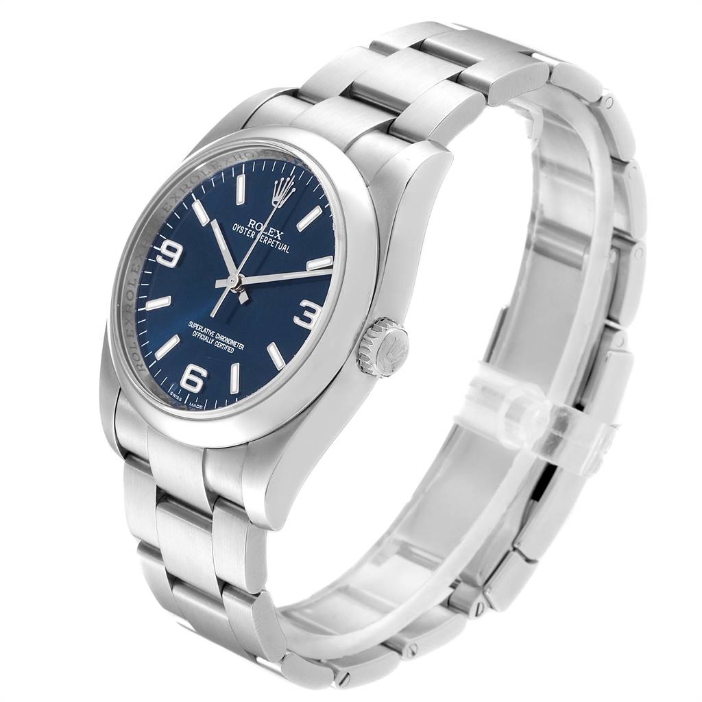 The Rolex Date 116000 Men's Stainless Steel Blue Dial 116000 Men's Stainless Steel Blue Dial model watch is shown at a slight angle, highlighting its blue dial, stainless steel case, and bracelet.