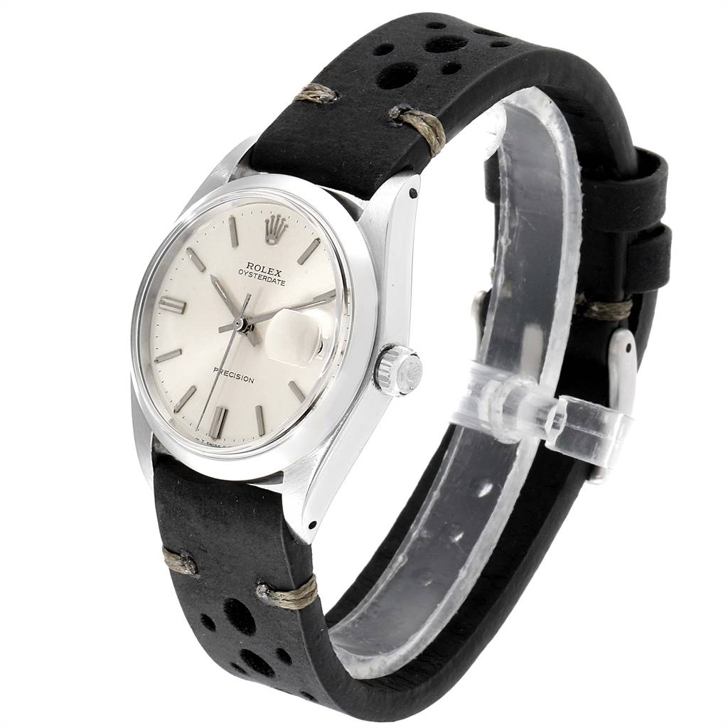 The Rolex Date 6694 Men's Stainless Steel Silver Dial 6694 Men's Stainless Steel Silver Dial model watch is shown at a slight angle, featuring the dial, case, crown, and black perforated strap.