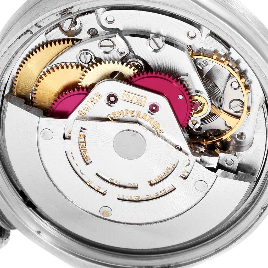 The image shows the internal mechanism and parts of a Rolex Date 1501 Men's Stainless Steel Silver Dial 1501 Men's Stainless Steel Silver Dial model watch at a close-up angle.