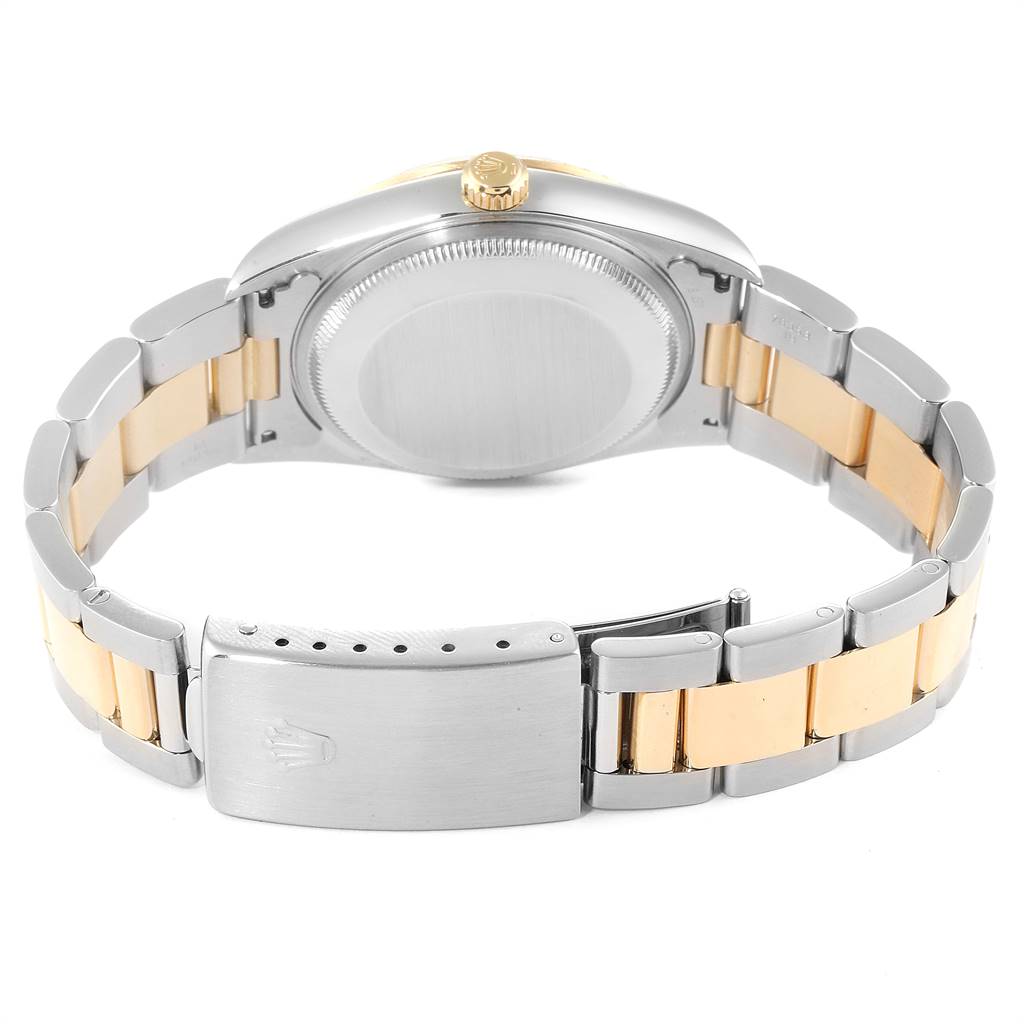 The image shows the back case, crown, and bracelet of a Rolex Date 15223 Men's Steel and Gold (two tone) White Dial 15223 Men's Steel and Gold (two tone) White Dial model watch in silver and gold tones.