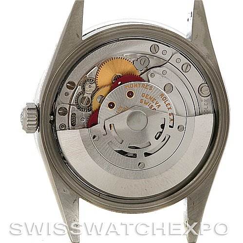 The image shows the back of a Rolex Date 15200 Men's Stainless Steel Silver Dial 15200 Men's Stainless Steel Silver Dial model watch, revealing its inner mechanical parts and movement.