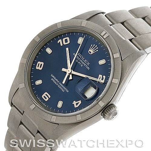 The image shows a Rolex Date 15210 Men's Stainless Steel Blue Dial 15210 Men's Stainless Steel Blue Dial model watch at a slight angle, highlighting its blue dial, markers, date window, and stainless steel bracelet.
