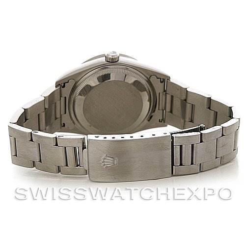 This image shows the back view of a Rolex Date 15210 Men's Stainless Steel Blue Dial 15210 Men's Stainless Steel Blue Dial model watch, highlighting the case back, crown, and bracelet with the clasp.