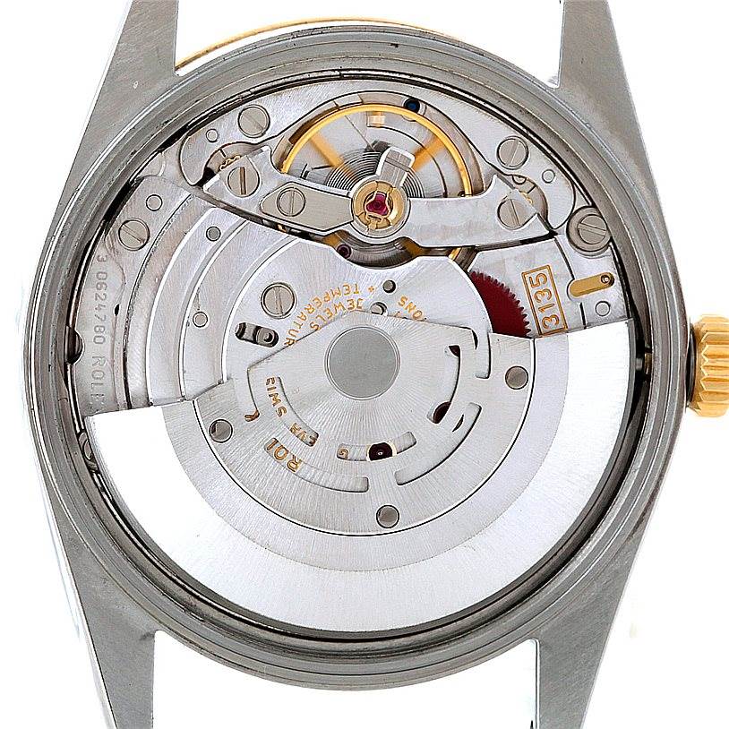 The image shows the internal movement of a Rolex Date 15203 Men's Steel and Gold (two tone) Grey Dial 15203 Men's Steel and Gold (two tone) Grey Dial model watch from a back angle.