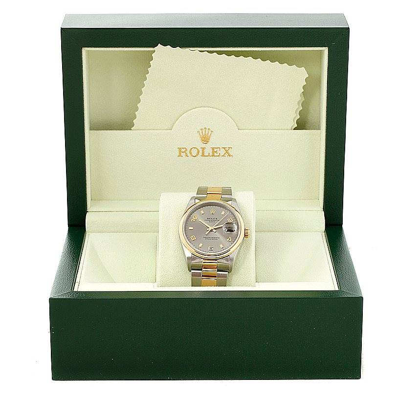 The Rolex Date 15203 Men's Steel and Gold (two tone) Grey Dial 15203 Men's Steel and Gold (two tone) Grey Dial model watch is shown from the front in its green display box.