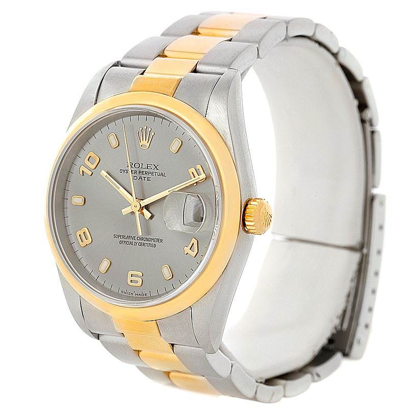 The Rolex Date 15203 Men's Steel and Gold (two tone) Grey Dial 15203 Men's Steel and Gold (two tone) Grey Dial watch is shown at a three-quarter side angle, highlighting the dial, bezel, crown, and bracelet.