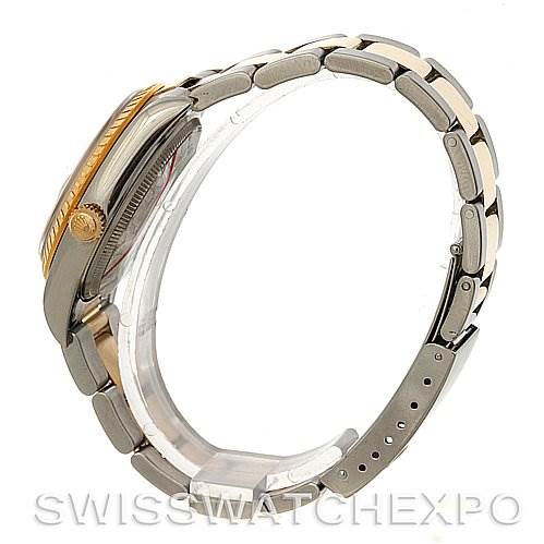 The image shows a side view of a Rolex Date 15223 Men's Steel and Gold (two tone) Blue Dial 15223 Men's Steel and Gold (two tone) Blue Dial model watch, highlighting its band, case, and crown.