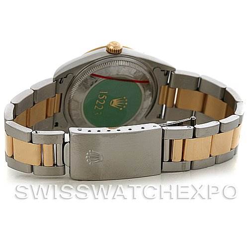 This image shows the clasp and the back case of a Rolex Date 15223 Men's Steel and Gold (two tone) Blue Dial 15223 Men's Steel and Gold (two tone) Blue Dial model watch.