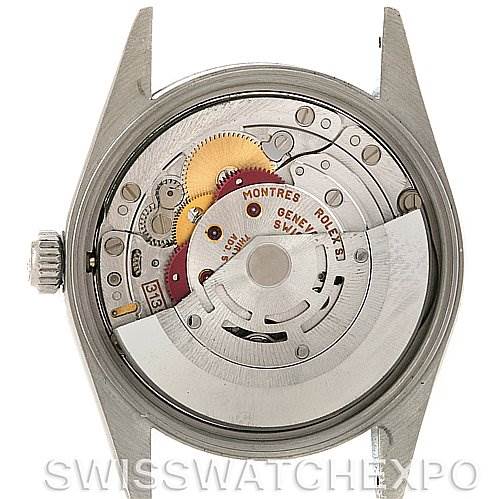 The image shows the inner mechanism of a Rolex Date 15210 Men's Stainless Steel White Dial 15210 Men's Stainless Steel White Dial model watch, viewed from the back with the case removed, highlighting its movement.