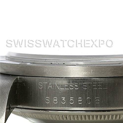 The image shows a side view of the case body and serial number engraving on a Rolex Date 15210 Men's Stainless Steel Black Dial 15210 Men's Stainless Steel Black Dial model watch.