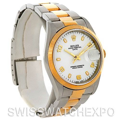 The image shows a Rolex Date 15203 Men's Steel and Gold (two tone) White Dial 15203 Men's Steel and Gold (two tone) White Dial model watch at a slight angle, displaying the dial, bezel, and part of the bracelet.