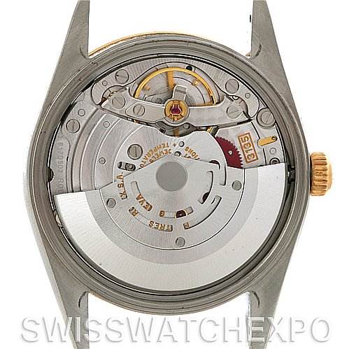 The image shows the back case opened, revealing the movement mechanism of a Rolex Date 15203 Men's Steel and Gold (two tone) White Dial 15203 Men's Steel and Gold (two tone) White Dial model watch.