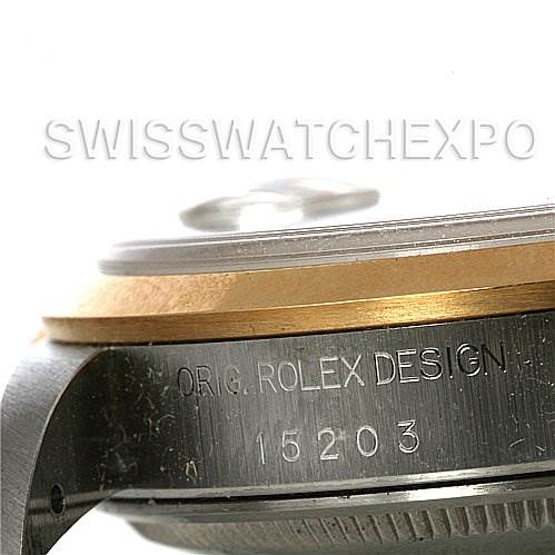 Close-up side view of a Rolex Date 15203 Men's Steel and Gold (two tone) White Dial 15203 Men's Steel and Gold (two tone) White Dial model showing the "ORIG. ROLEX DESIGN 15203" engraving.