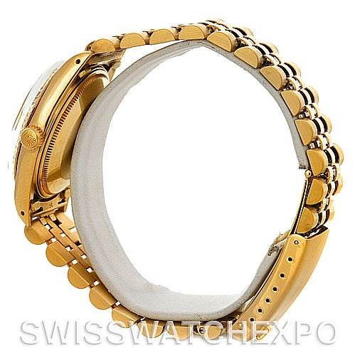 The image shows a side view of the Rolex Date 15037 Men's Yellow Gold Champagne Dial 15037 Men's Yellow Gold Champagne Dial model watch, focusing on its gold bracelet and case.