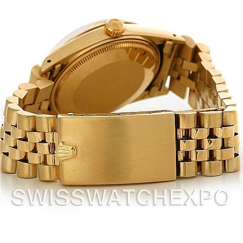 This image shows the back case and bracelet of a Rolex Date 15037 Men's Yellow Gold Champagne Dial 15037 Men's Yellow Gold Champagne Dial model watch, focusing on the clasp and portions of the link bracelet.