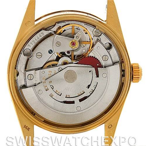 The image shows the movement and internal mechanism of a Rolex Date 15037 Men's Yellow Gold Champagne Dial 15037 Men's Yellow Gold Champagne Dial model from the backside without the case back.