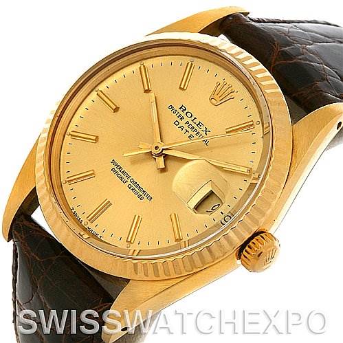 The image shows a close-up angled view of a Rolex Date 15037 Men's Yellow Gold Champagne Dial 15037 Men's Yellow Gold Champagne Dial model watch, highlighting the gold dial, crown, and brown leather strap.