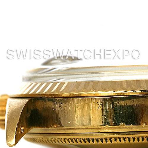 This image shows a close-up side view of the Rolex Date 15037 Men's Yellow Gold Champagne Dial 15037 Men's Yellow Gold Champagne Dial model's case, focusing on the bezel and part of the crown.