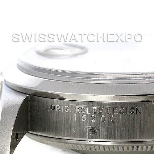 This image shows a side angle of a Rolex Date 15200 Men's Stainless Steel White Dial 15200 Men's Stainless Steel White Dial model watch, highlighting the case and engraved serial number "ORIG. ROLEX DESIGN 15200".