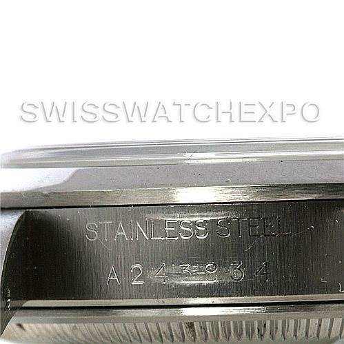 This close-up image shows the side of a Rolex Date 15200 Men's Stainless Steel Blue Dial 15200 Men's Stainless Steel Blue Dial model watch, highlighting the engraved "STAINLESS STEEL" marking and serial number.