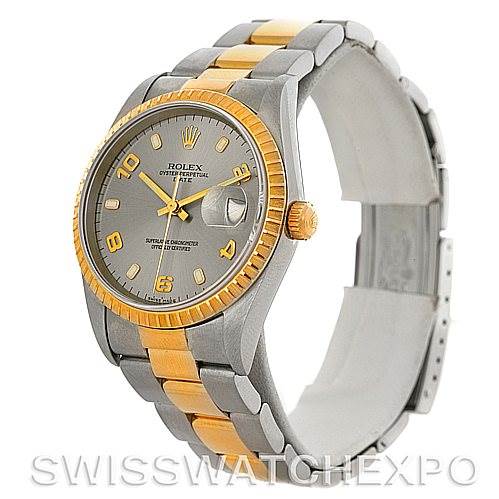 The image shows a side-angle view of a Rolex Date 15223 Men's Steel and Gold (two tone) Grey Dial 15223 Men's Steel and Gold (two tone) Grey Dial model watch, highlighting its two-tone metal bracelet, gold fluted bezel, and grey dial.