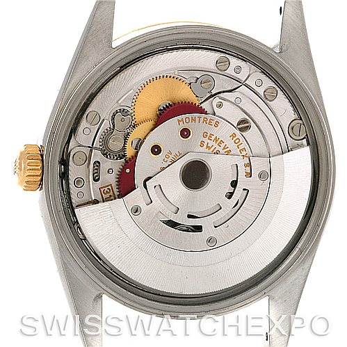 The image shows the back of the Rolex Date 15223 Men's Steel and Gold (two tone) Grey Dial 15223 Men's Steel and Gold (two tone) Grey Dial model watch, revealing its internal mechanical movement and rotor.