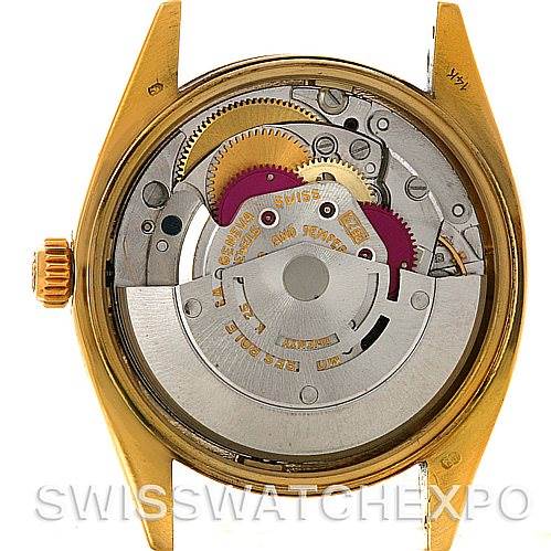 This image shows the open case back view of a Rolex Date 1503 Men's Yellow Gold Black Dial 1503 Men's Yellow Gold Black Dial model, displaying the movement and internal components.