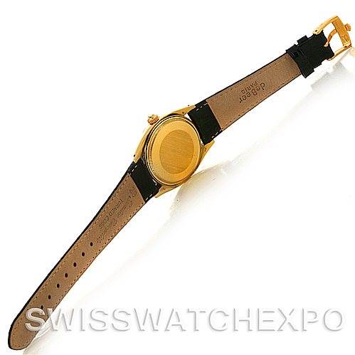 This image shows the back view of a Rolex Date 1503 Men's Yellow Gold Black Dial 1503 Men's Yellow Gold Black Dial model watch, highlighting the case back, leather strap, and buckle.