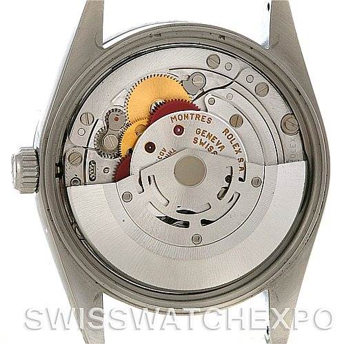 The image shows the back view of a Rolex Date 15200 Men's Stainless Steel Blue Dial 15200 Men's Stainless Steel Blue Dial model watch, revealing its intricate mechanical movement and inner components.