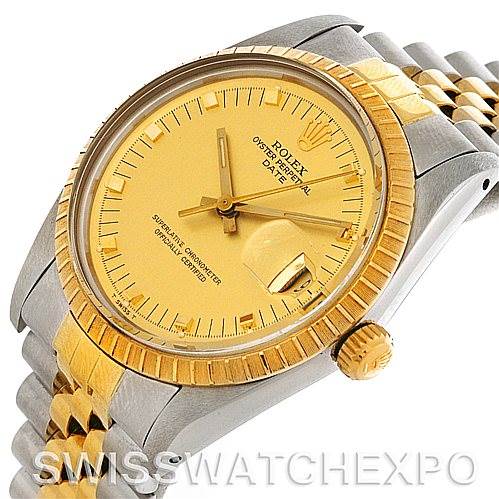 The image shows a side angle of a Rolex Date 15053 Men's Stainless Steel Champagne Dial 15053 Men's Stainless Steel Champagne Dial model watch, displaying its yellow-gold dial, fluted bezel, and two-tone bracelet.