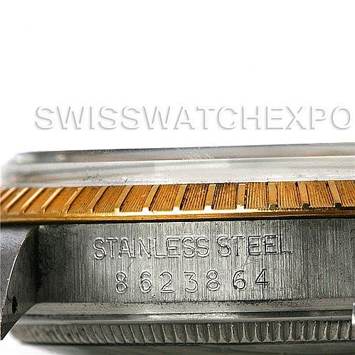 This is a close-up view of the side of a Rolex Date 15053 Men's Stainless Steel Champagne Dial 15053 Men's Stainless Steel Champagne Dial model watch, showing the stainless steel casing and partial bezel.