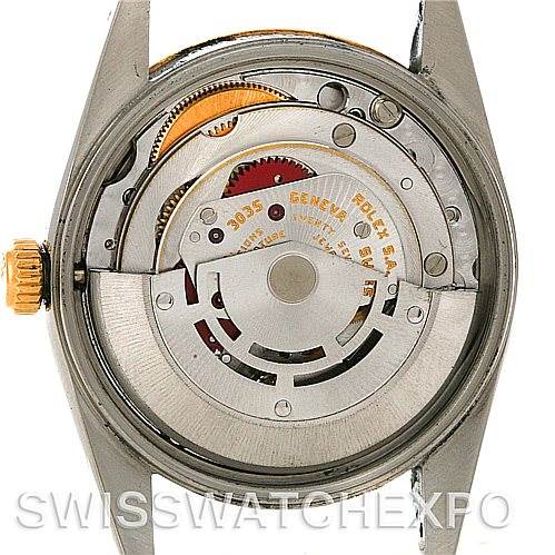 The image shows the back view of a Rolex Date 15053 Men's Stainless Steel Champagne Dial 15053 Men's Stainless Steel Champagne Dial model watch, displaying its internal mechanical movement.