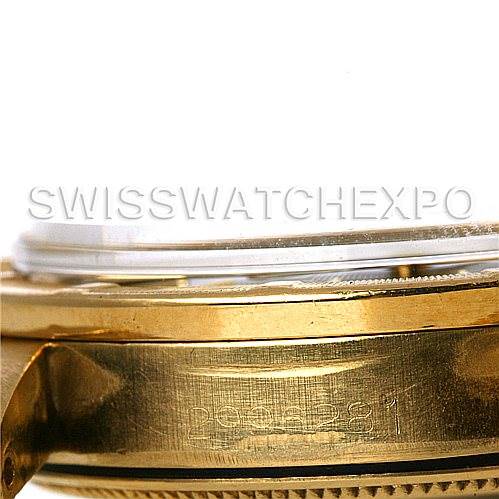 The image shows a side view of the Rolex Date 1503 Men
s Yellow Gold Black Dial 1503 Men
s Yellow Gold Black Dial model, highlighting its gold casing and partially visible flange and crystal.