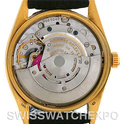 The image shows the movement and inner mechanics of a Rolex Date 1503 Men
s Yellow Gold Black Dial 1503 Men
s Yellow Gold Black Dial model watch from the back angle with the case removed.