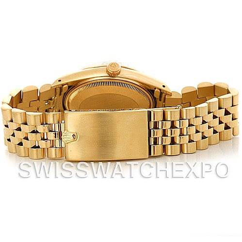 This image shows the back view of a gold Rolex Date 15037 Men's Yellow Gold Champagne Dial 15037 Men's Yellow Gold Champagne Dial model watch, focusing on the case and Jubilee bracelet.