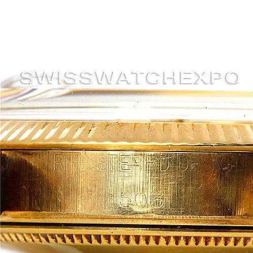 This image shows the side view of the bezel and case with the inscription on a Rolex Date 1503 Men's Yellow Gold Champagne Dial 1503 Men's Yellow Gold Champagne Dial model watch.