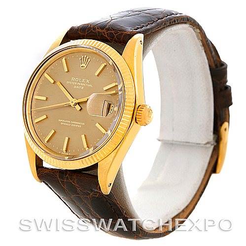 The Rolex Date 1503 Men's Yellow Gold Champagne Dial 1503 Men's Yellow Gold Champagne Dial model watch is shown from an angled side view, highlighting the dial, bezel, crown, and leather strap.