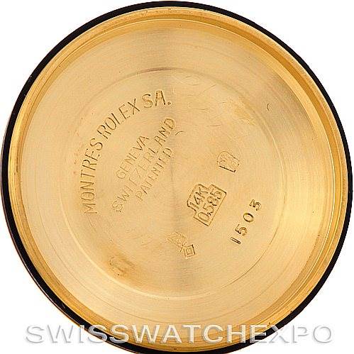 This image shows the inside case back of a Rolex Date 1503 Men's Yellow Gold Champagne Dial 1503 Men's Yellow Gold Champagne Dial model watch, displaying engravings and hallmarks.
