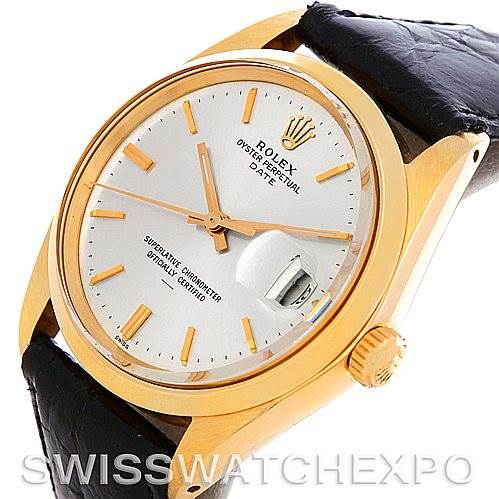 The image shows a close-up of the Rolex Date 1503 Men's Yellow Gold Silver Dial 1503 Men's Yellow Gold Silver Dial model watch, displaying the face, crown, and part of the leather strap.