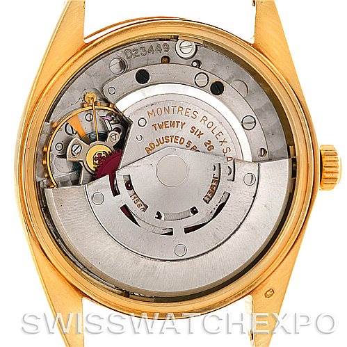 The image shows the back view of a Rolex Date 1503 Men's Yellow Gold Silver Dial 1503 Men's Yellow Gold Silver Dial model, exposing its movement and internal mechanisms.