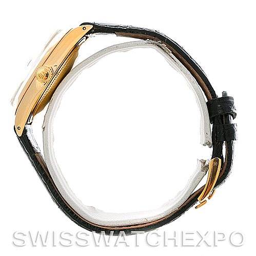 The image shows a side angle view of the Rolex Date 1503 Men's Yellow Gold Silver Dial 1503 Men's Yellow Gold Silver Dial watch, highlighting the gold case and black leather strap.