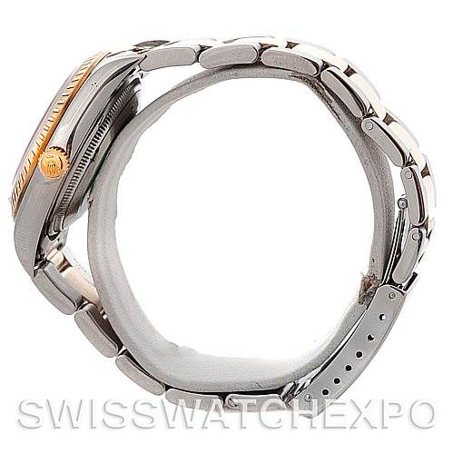 This image shows a side view of a Rolex Date 15223 Men's Steel and Gold (two tone) White Dial 15223 Men's Steel and Gold (two tone) White Dial model watch, highlighting its bezel, crown, and bracelet.